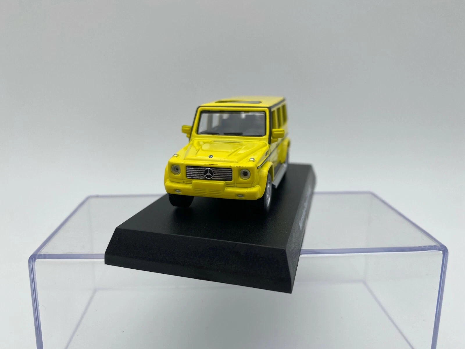 KYOSHO 1:64 MERCEDES BENZ G 55 AMG AMARILLO - Imagen 3