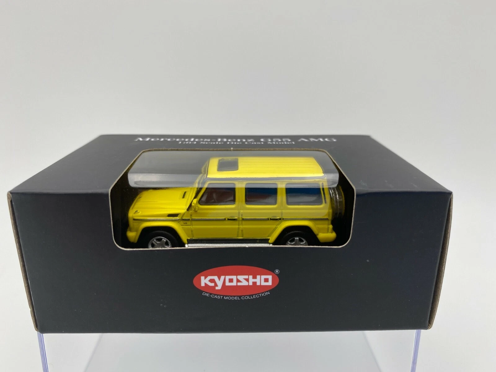 KYOSHO 1:64 MERCEDES BENZ G 55 AMG AMARILLO - Imagen 2