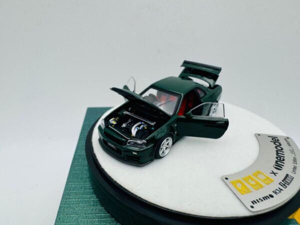 PGM 1:64 NISSAN GTR R34 Z-TUNE BRITISH GREEN LUXURY VERSION - Image 7