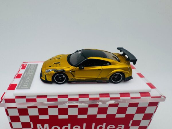 MODEL IDEA 1:64 NISSAN GTR R35 TOP SECRET TAO GOLD