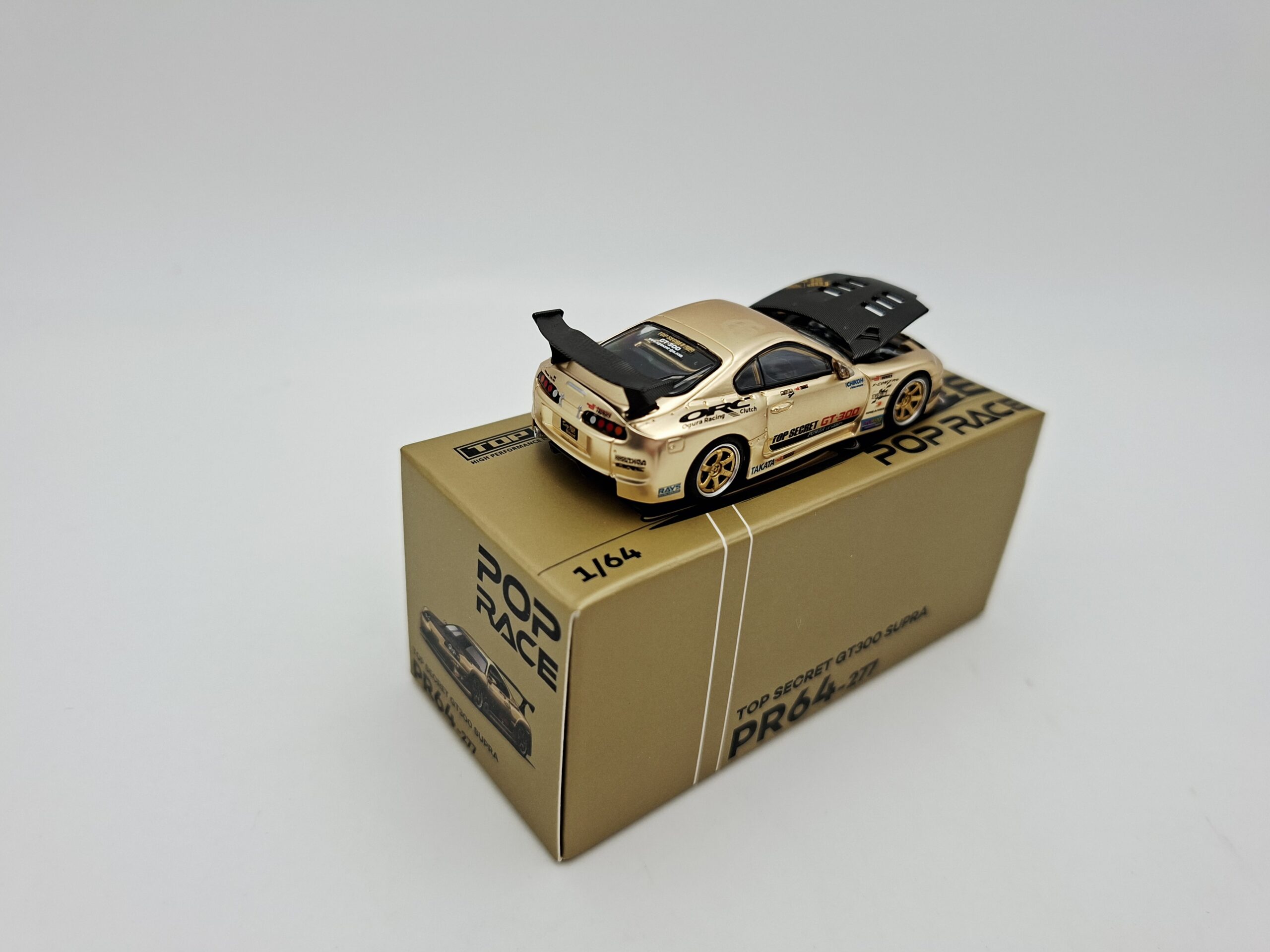 POP RACE 1:64 TOYOTA SUPRA TOP SECRET GT300 GOLD NOVEDAD - Image 3