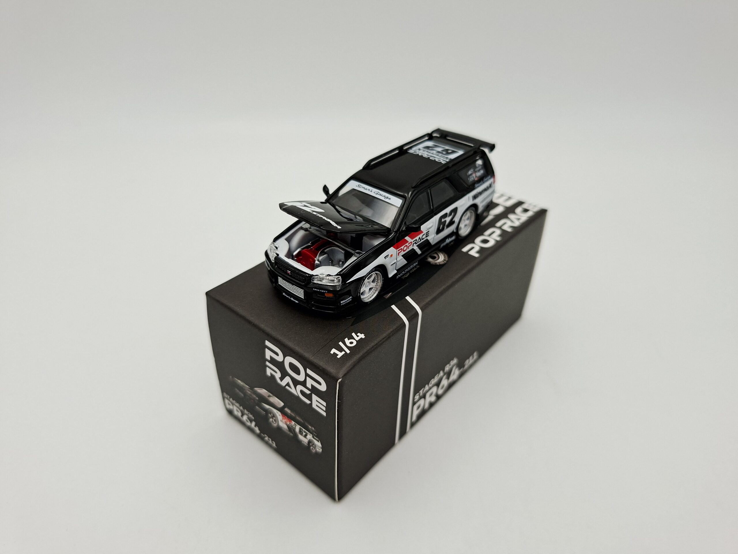 POP RACE 1:64 NISSAN STAGEA R34 SIMONS GARAGE NOVEDAD - Image 2