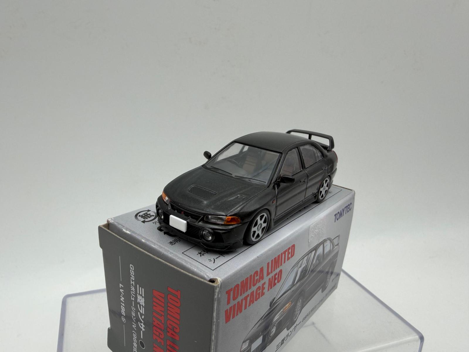 OUTLET 1:64 TOMICA MITSUBISHI LANCER EVOLUTION - Imagen 2